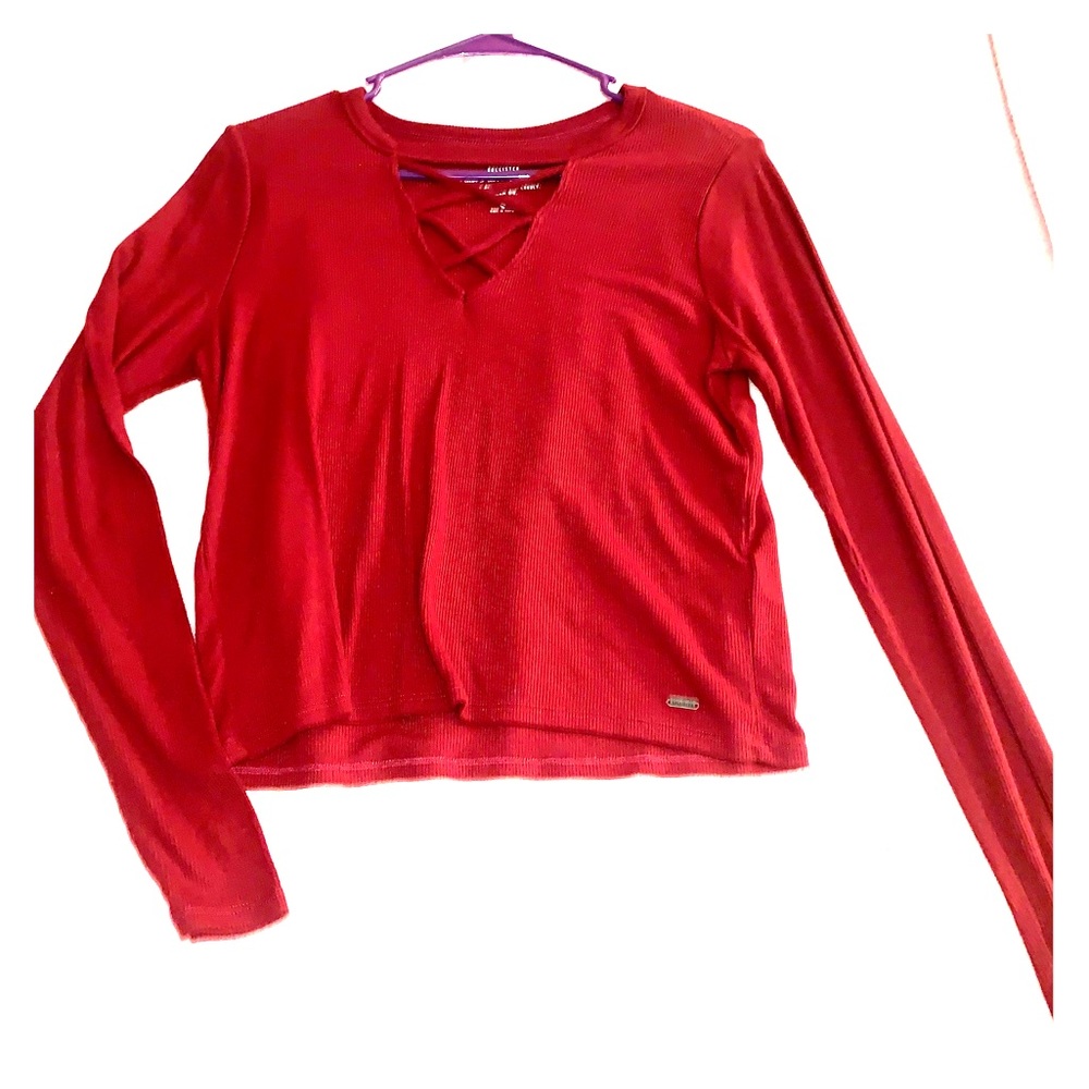 maroon long sleeved shirt